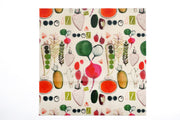 white reusable food wrap with colorful vegetable and fruit print