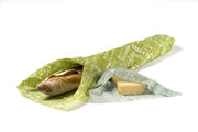 Baguette and cheese wrapped in green beeswax food wraps 