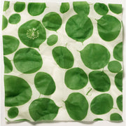 bees wax wrap in white with bright green leaves motif