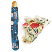 baguette and grapefruit wrapped in blue and white reusable beeswax wraps